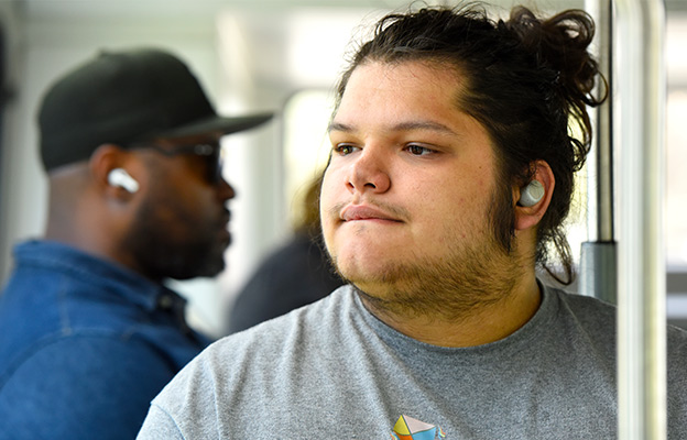 A person sitting on a bus