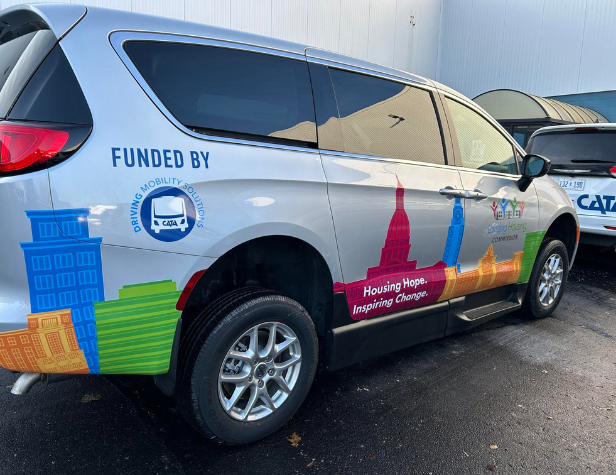 A van with a wrap funded by the 5310 program