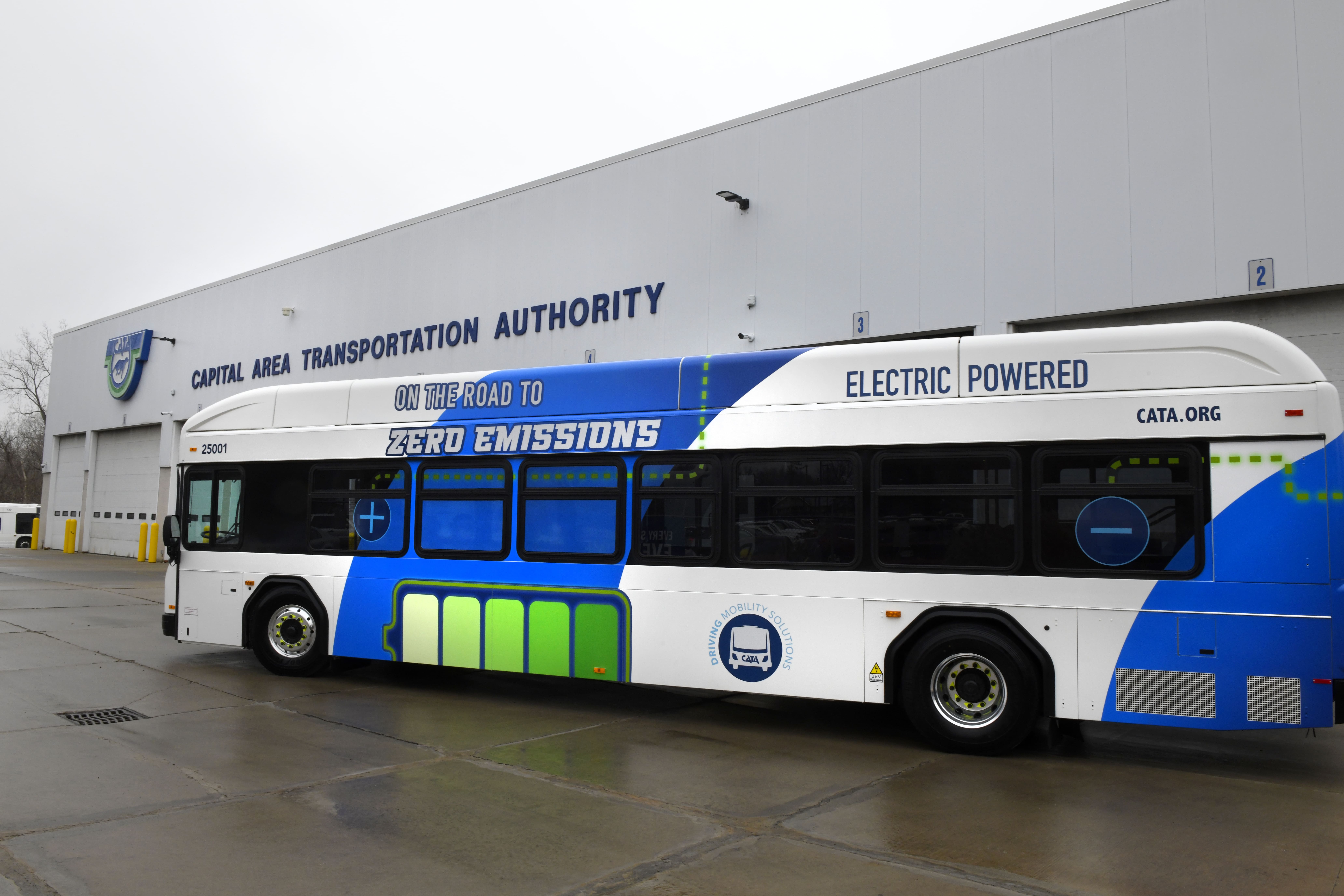 CATA's electric bus driving out of the garage