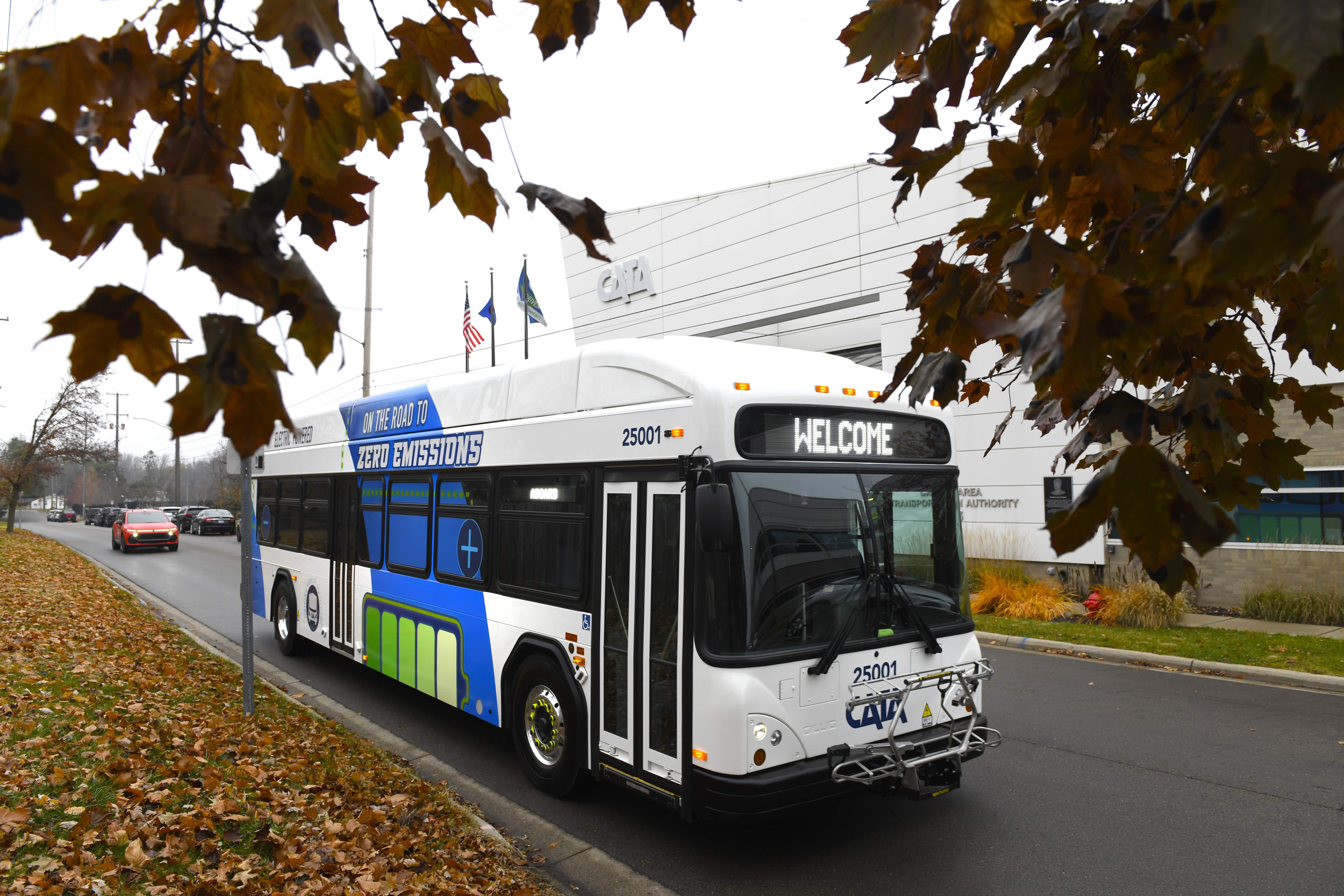 CATA's electric bus driving down the street