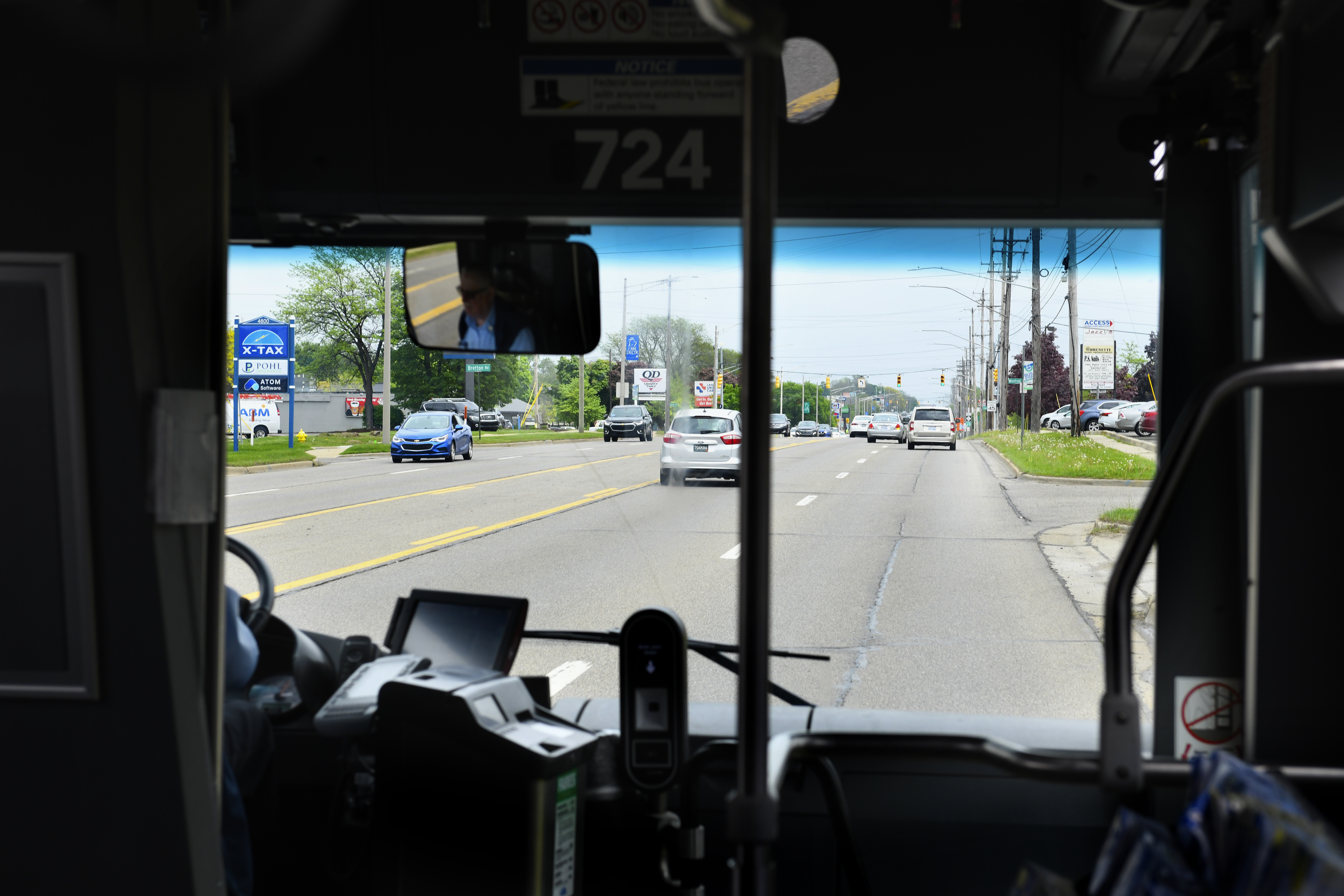 Front of a CATA bus showing the farebox and validator