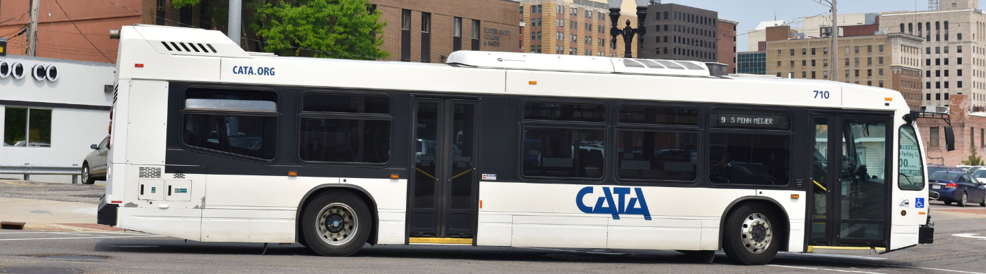 CATA bus driving down the road