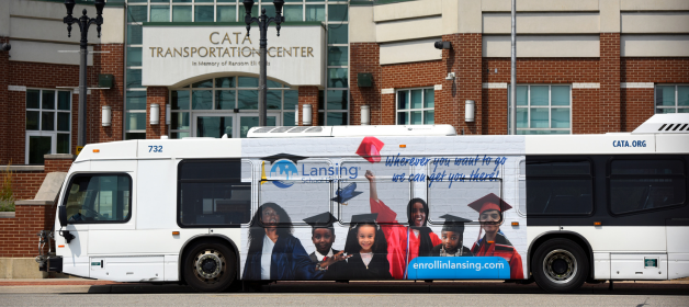 Lansing School District wrapped CATA bus parked in front of the CATA Transportation Center