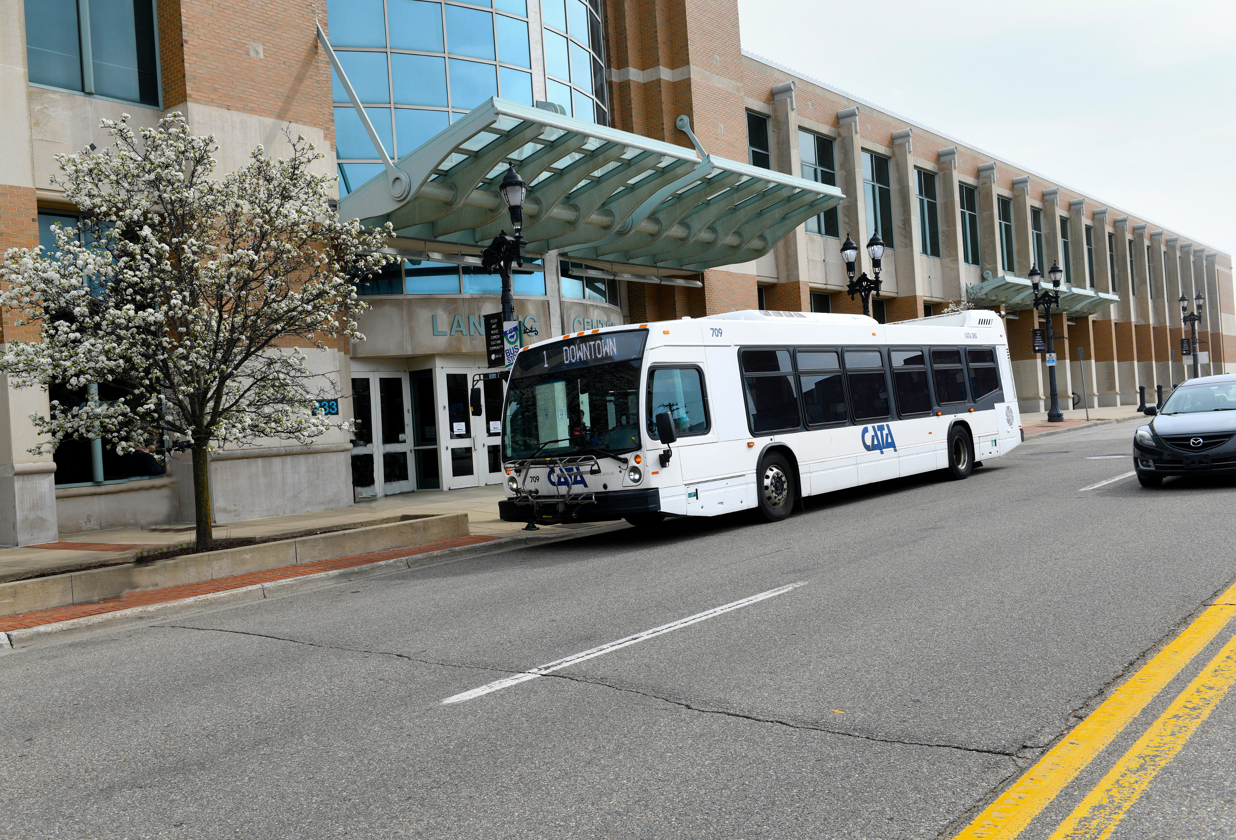 CATA bus standing at a bus stop.