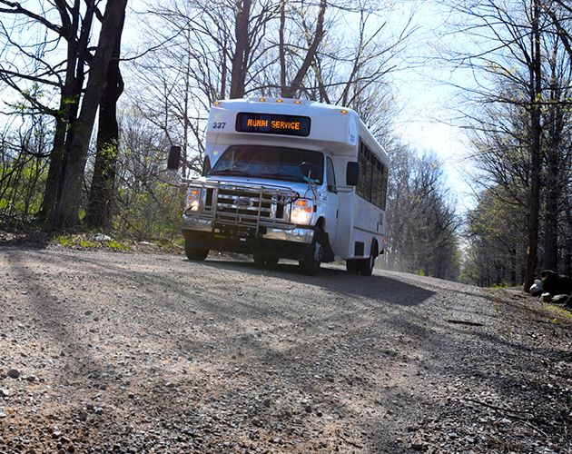 CATA Rural Service vehicle driving down a dirt road