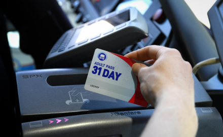 A person using an adult 31 day pass at a CATA farebox