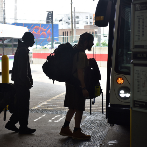 People boarding a CATA bus