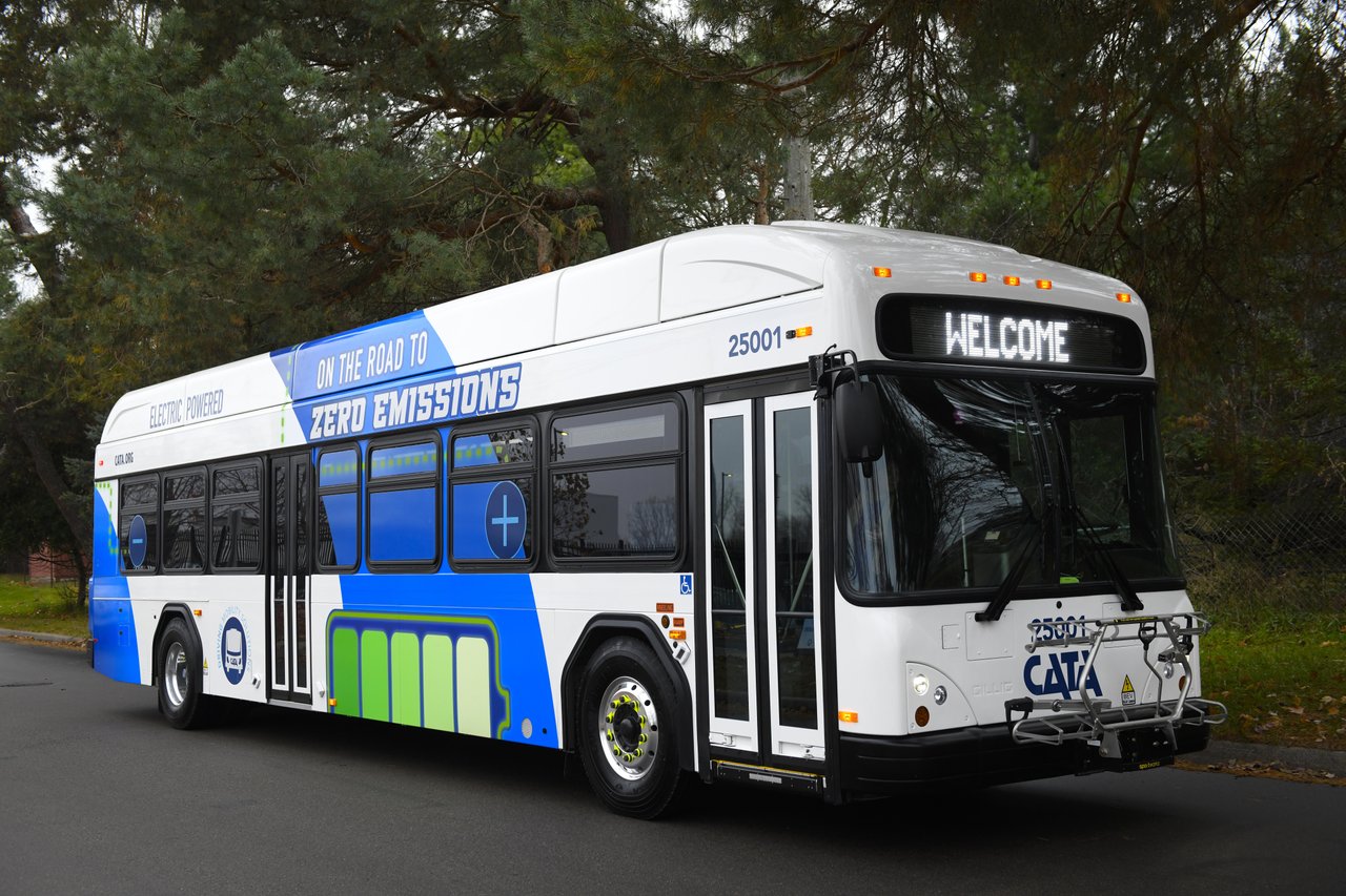 CATA's first electric bus with a custom wrap featuring "On the road to zero emissions" with electric imagry