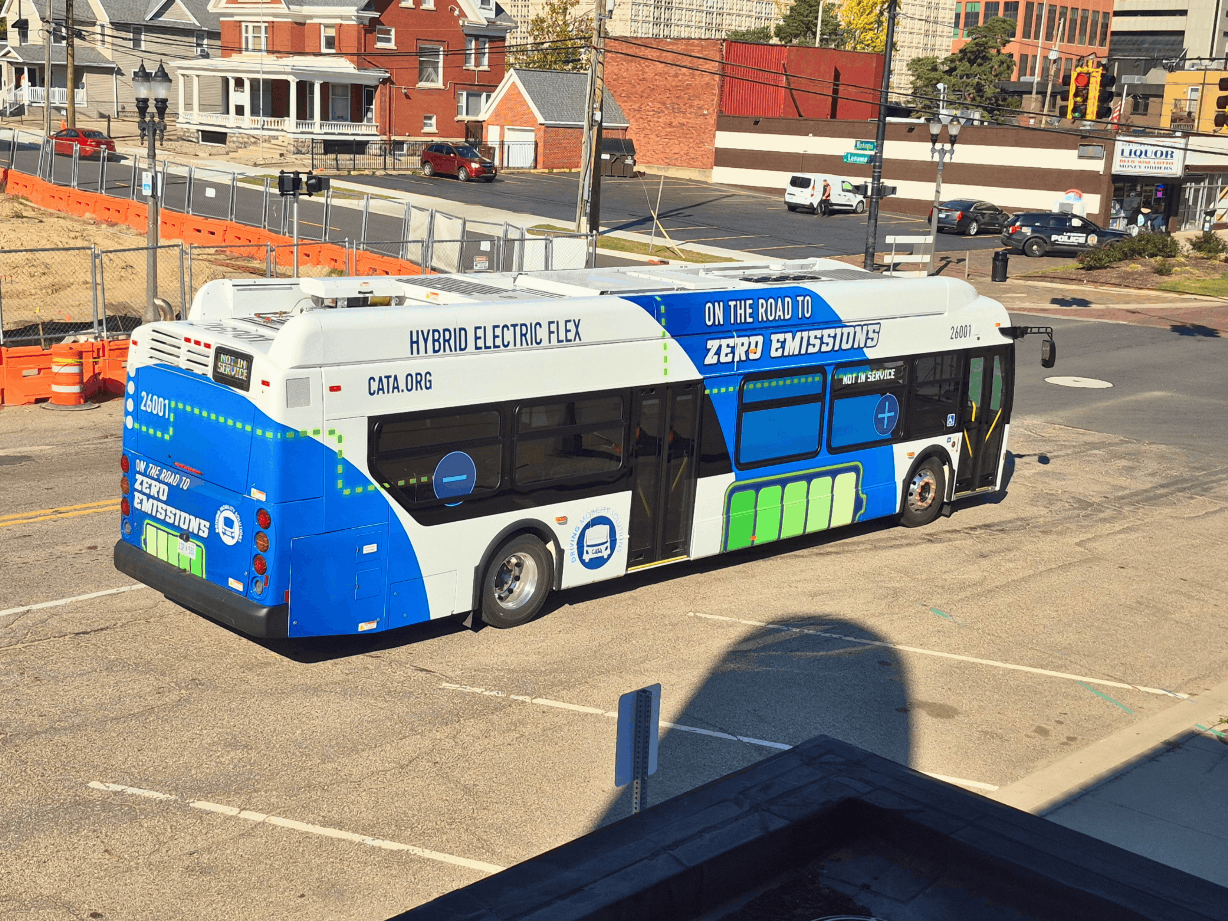 CATA's Hybrid Electric Flex vehicle driving in Downtown Lansing