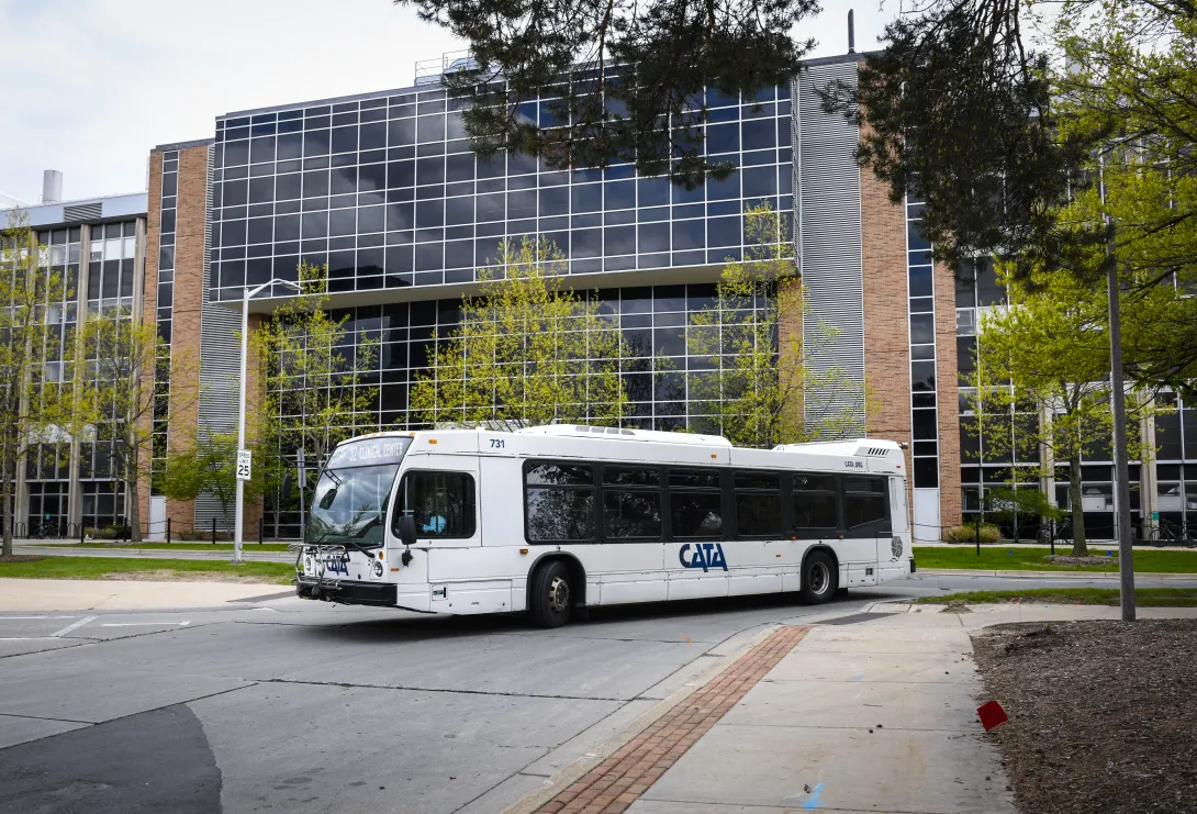CATA Route 32 bus on MSU's campus entering Ramp 1
