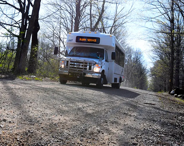 CATA Rural Service vehicle driving down a dirt road