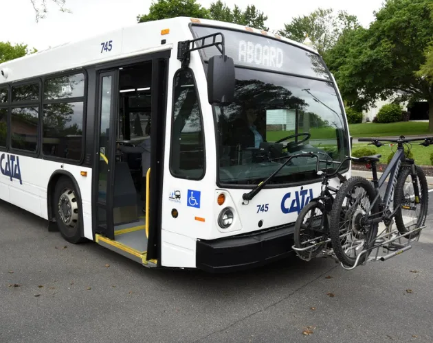 CATA bus with bikes on the bike rack saying welcome aboard